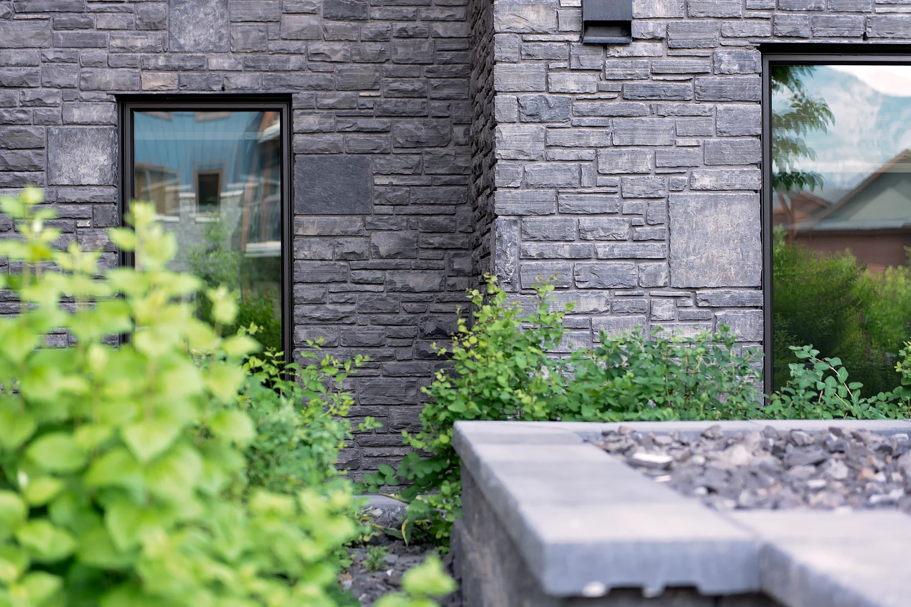 Stone masonry facade at Arnica Lodge